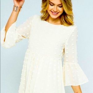 Pom Pom bell sleeve dress